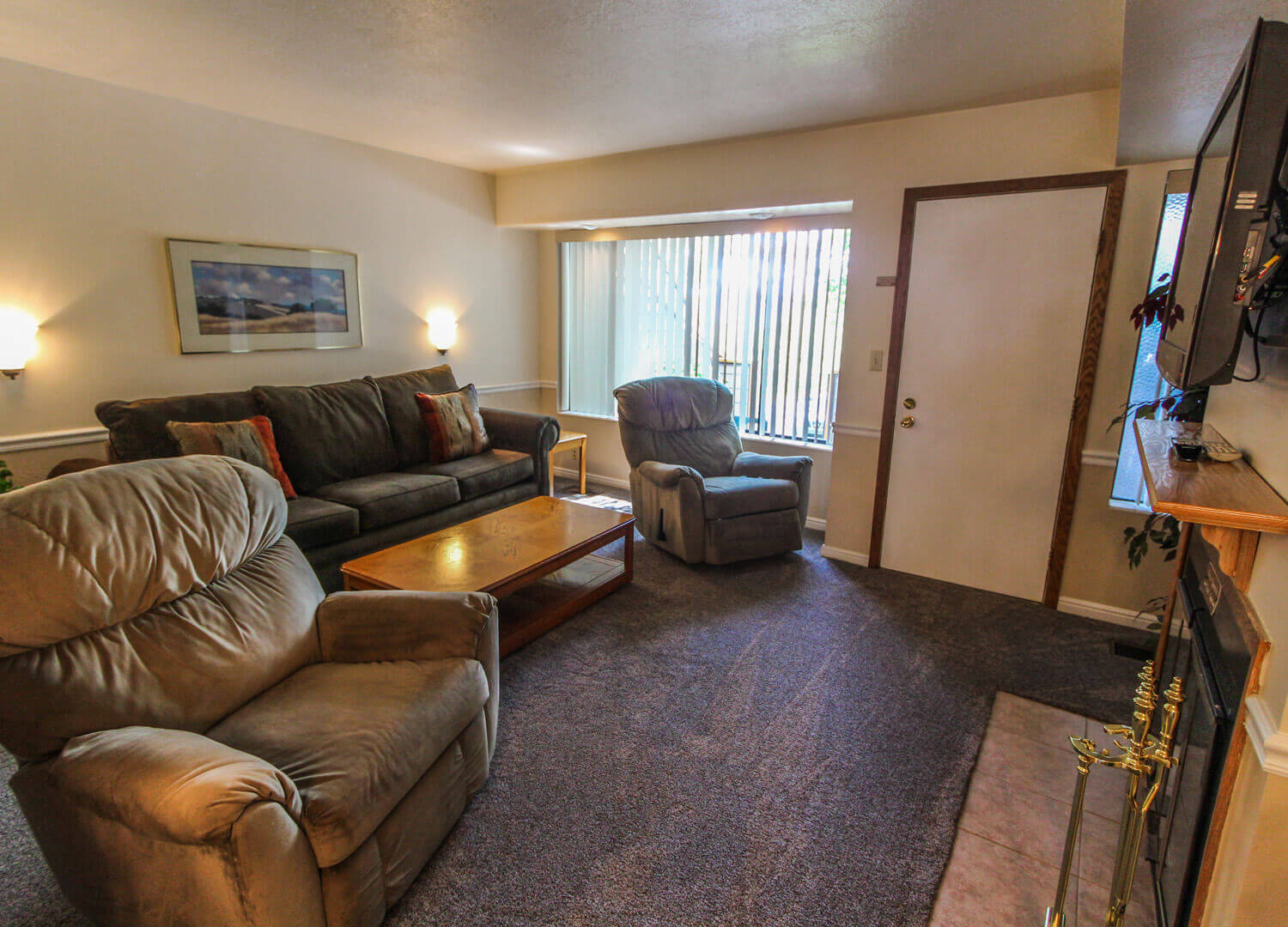 A cozy living room at VRI's Wolf Creek Village I in Eden, Utah.